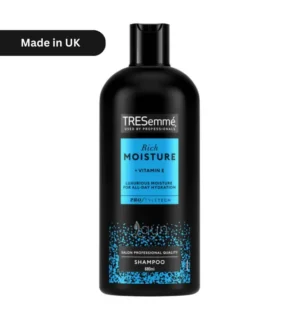 "TRESemmé Rich Moisture Shampoo 680ml bottle with blue-and-black design, featuring Vitamin E and PHO Blend for all-day hydration in Bangladesh’s climate. Salon-professional hydration for silky, nourished hair."