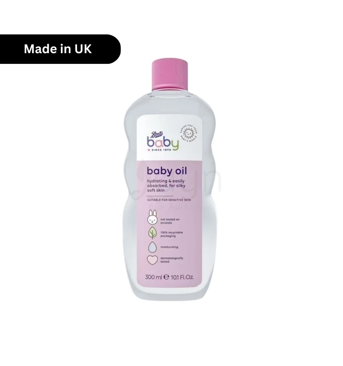 Boots Baby Oil 300ml bottle with pink cap and pink-white label, Made in UK.